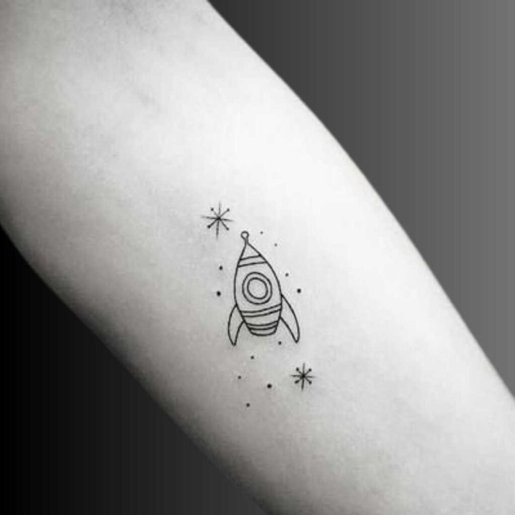 Minimalist Spaceship Silhouette Alien Tattoo Design